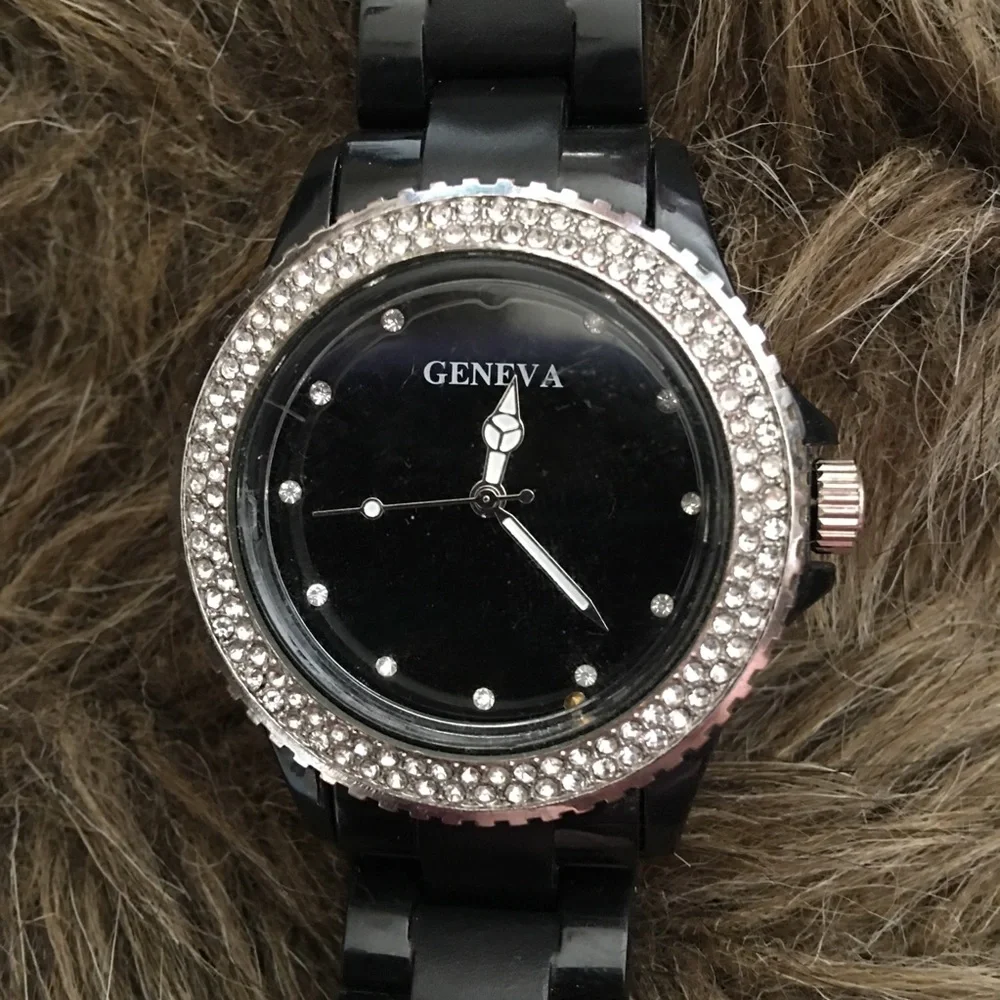 Ladies Geneva black plastic band rhinestone watch